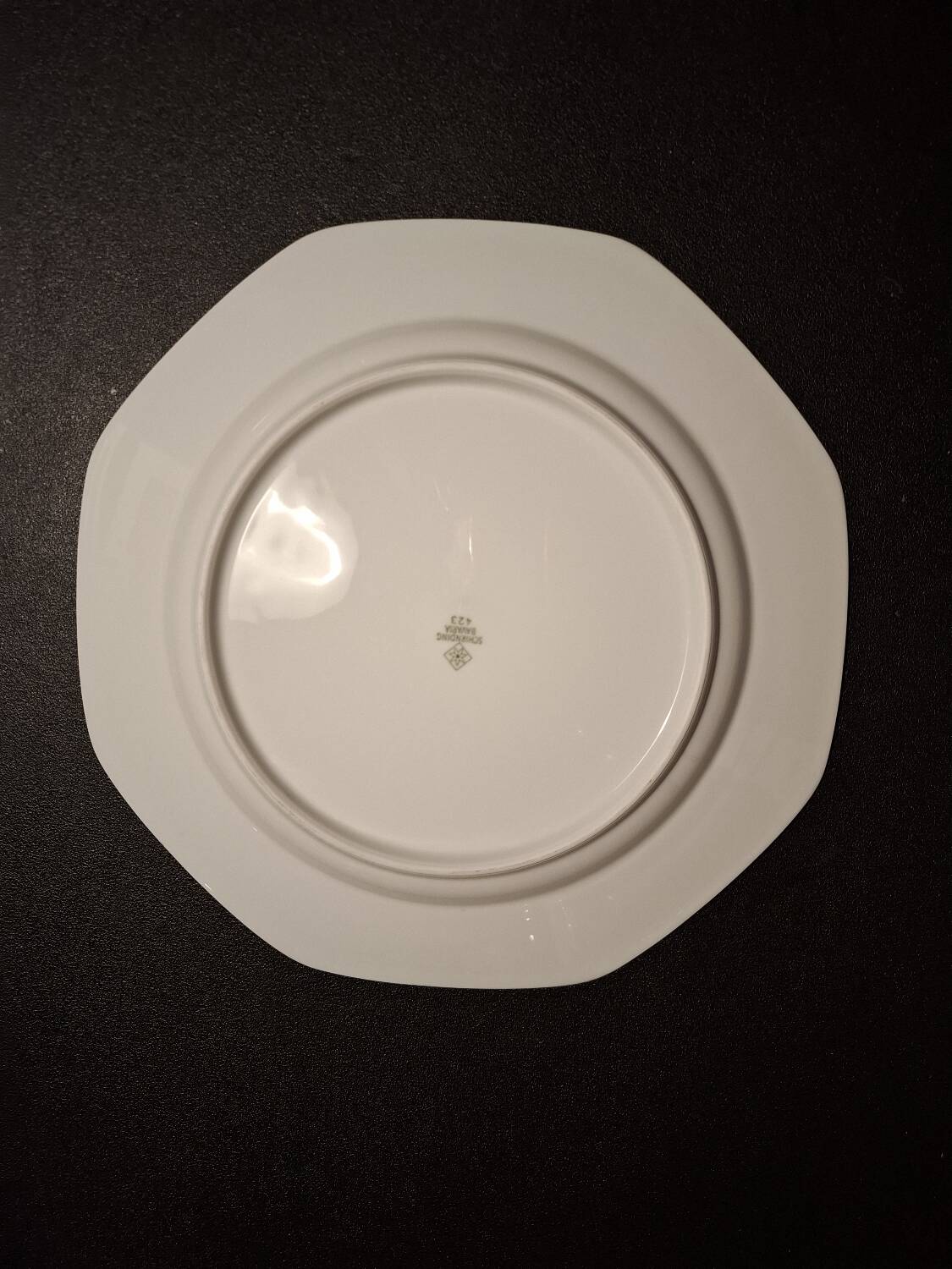 Dishes and porcelain sauceboat