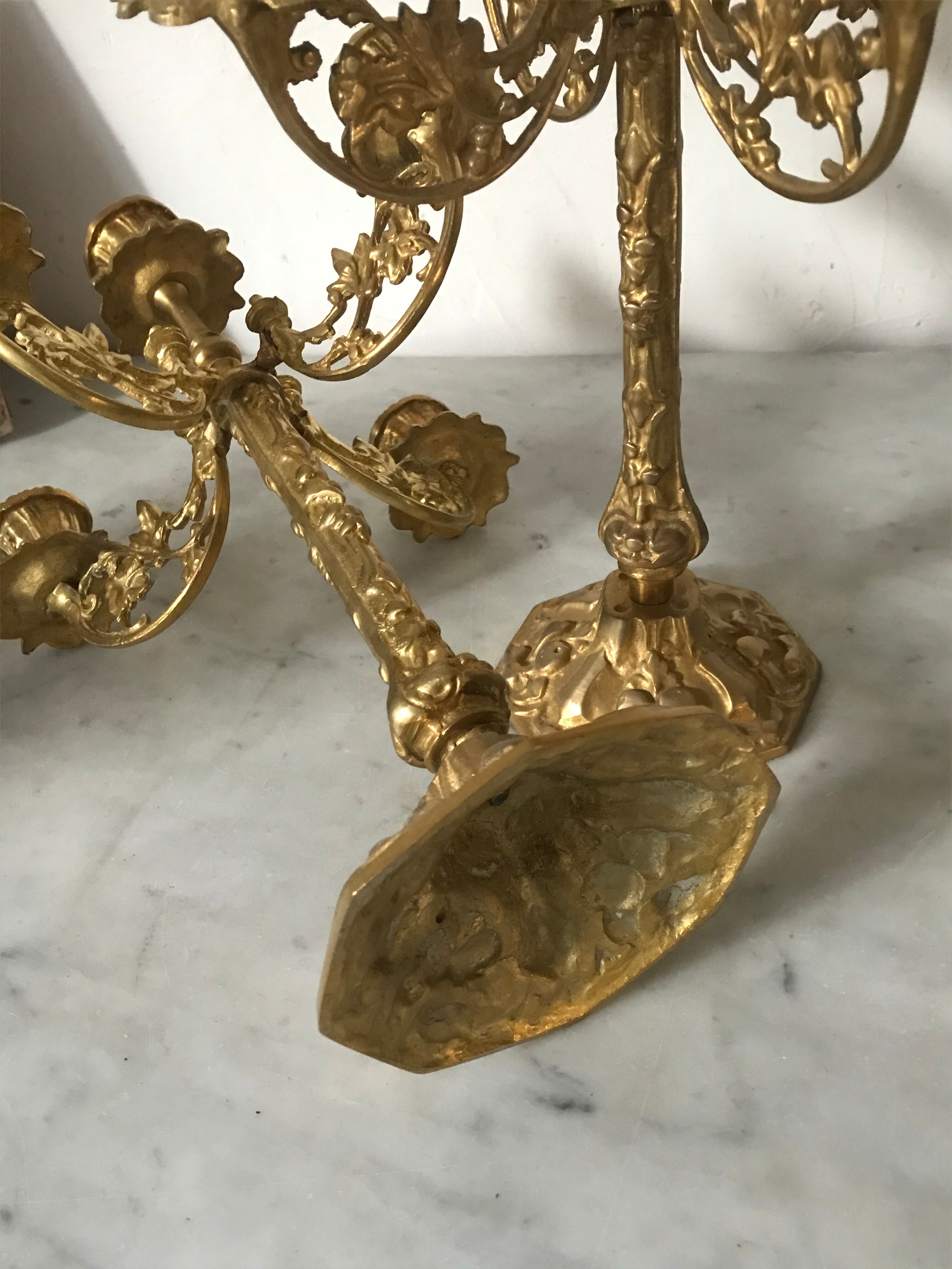 Pair of golden brass candlesticks