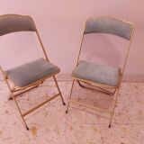 Two folding opera chairs in velvet