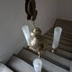 Brass chandelier with three flames.