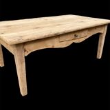 Antique coffee table in raw pine