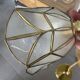 Italian lampshade applique from the 1970s in mother-of-pearl and gilded brass.