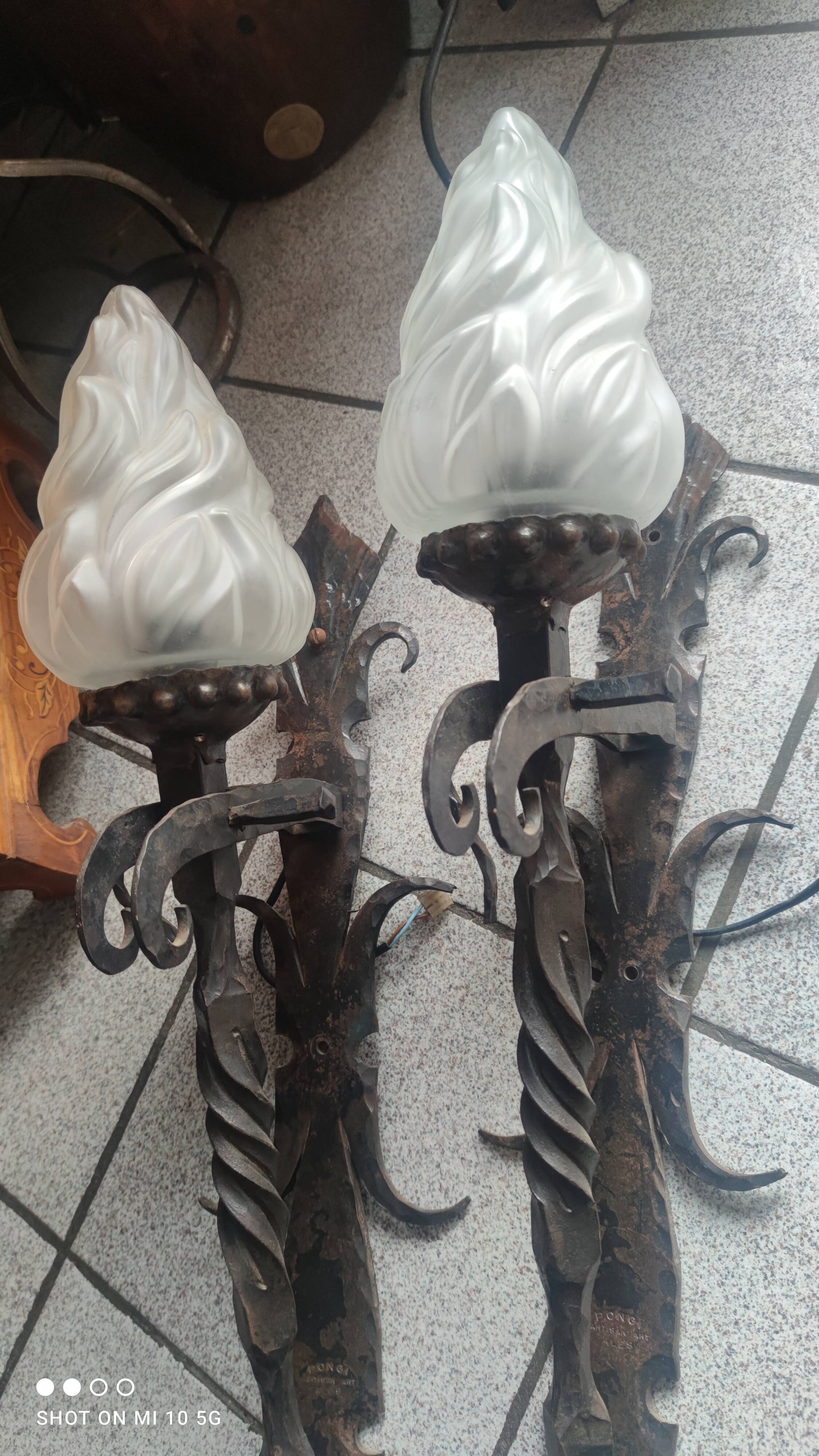 Pair of steel and glass torchieres circa 1950