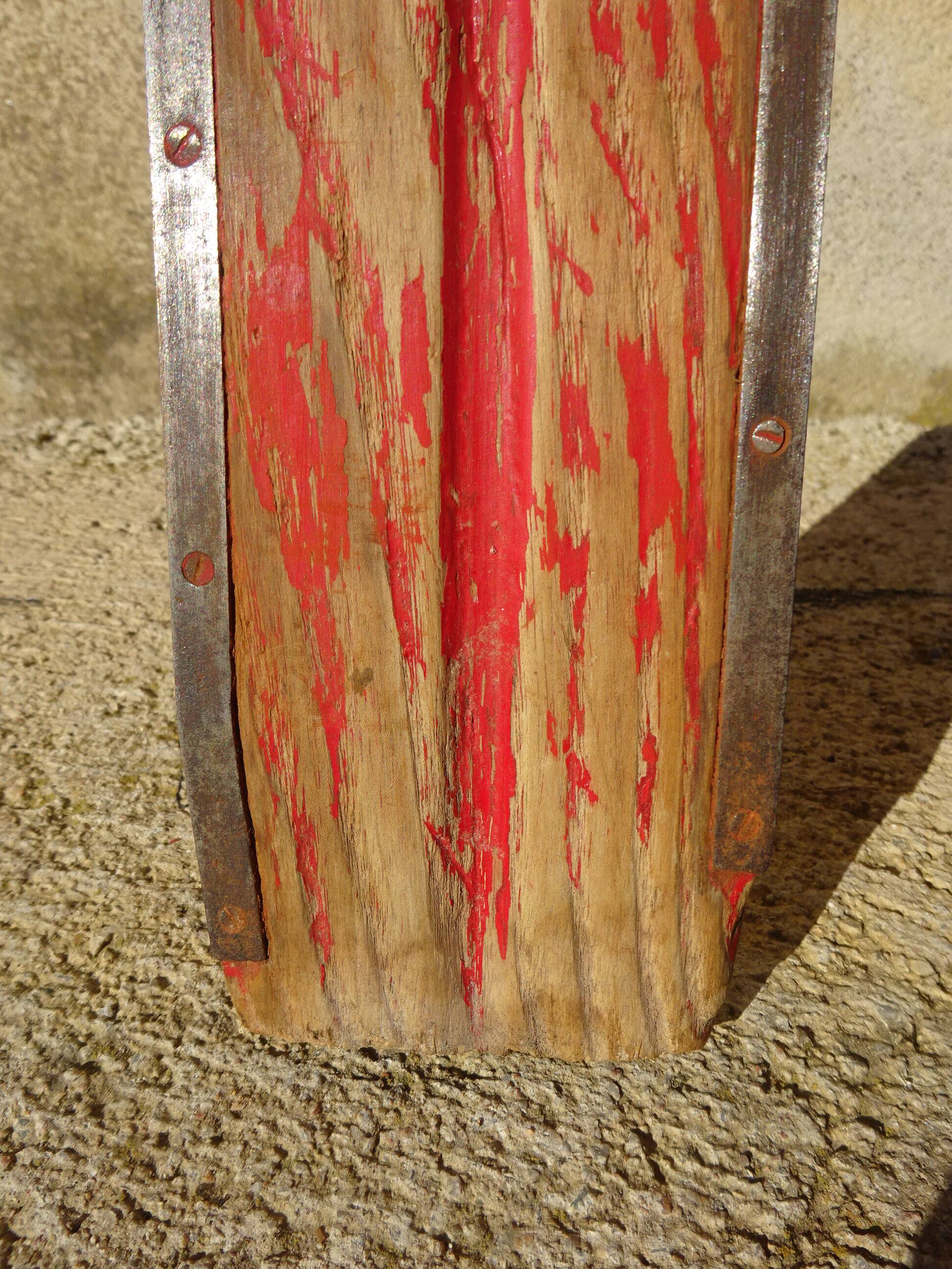 Pair of old wooden skis and metal bindings altiere