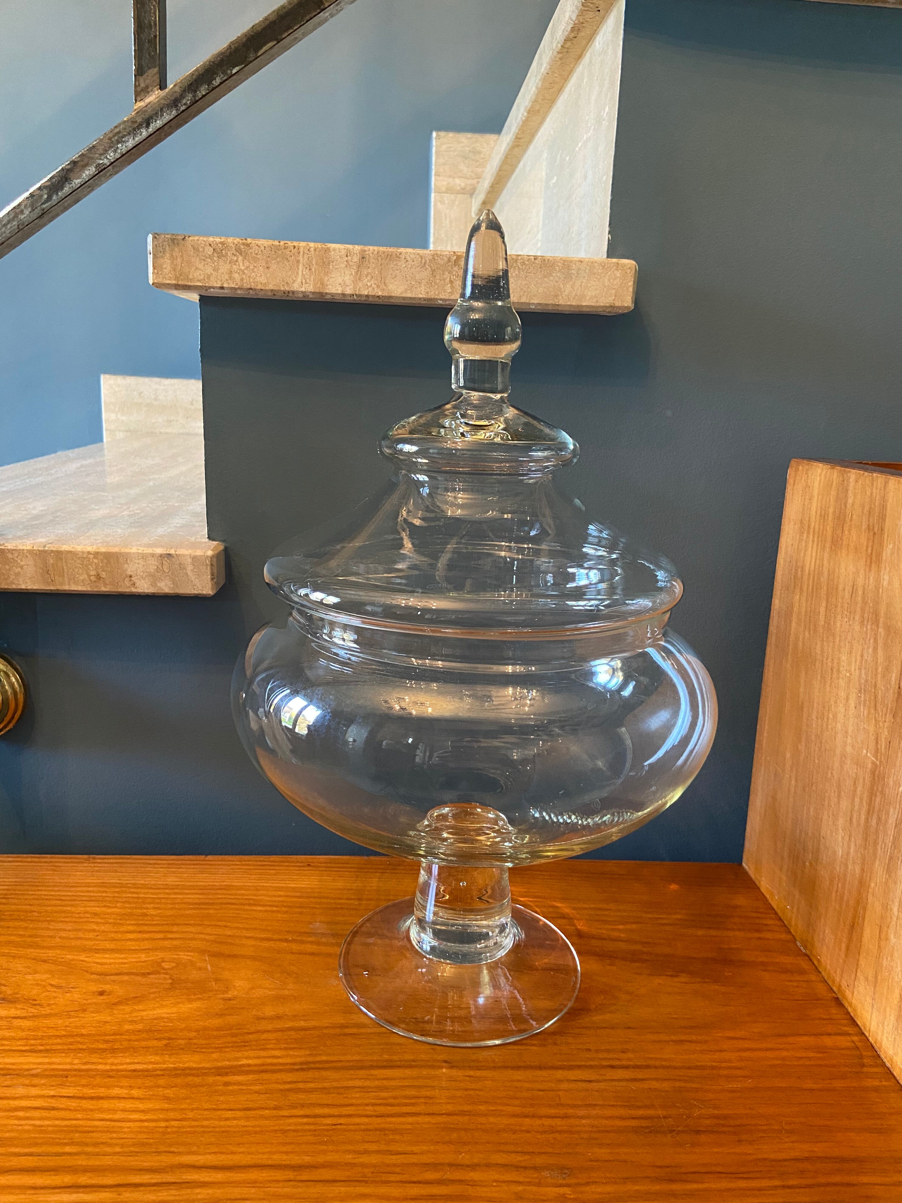 Glass jar on pedestal