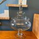 Glass jar on pedestal
