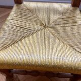 Low chair in wood and woven straw