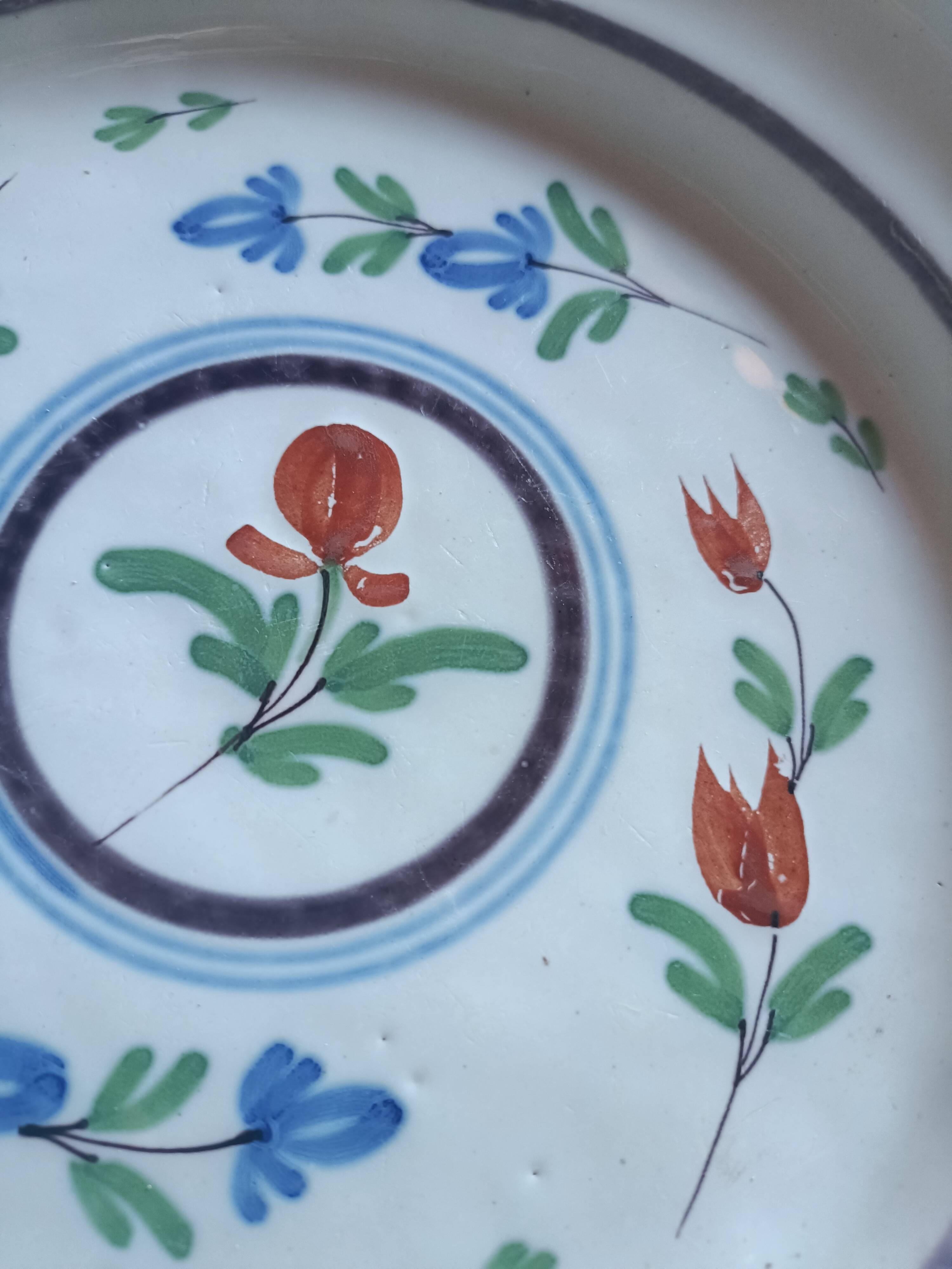 Two 19th-century plates in earthenware.