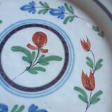 Two 19th-century plates in earthenware.