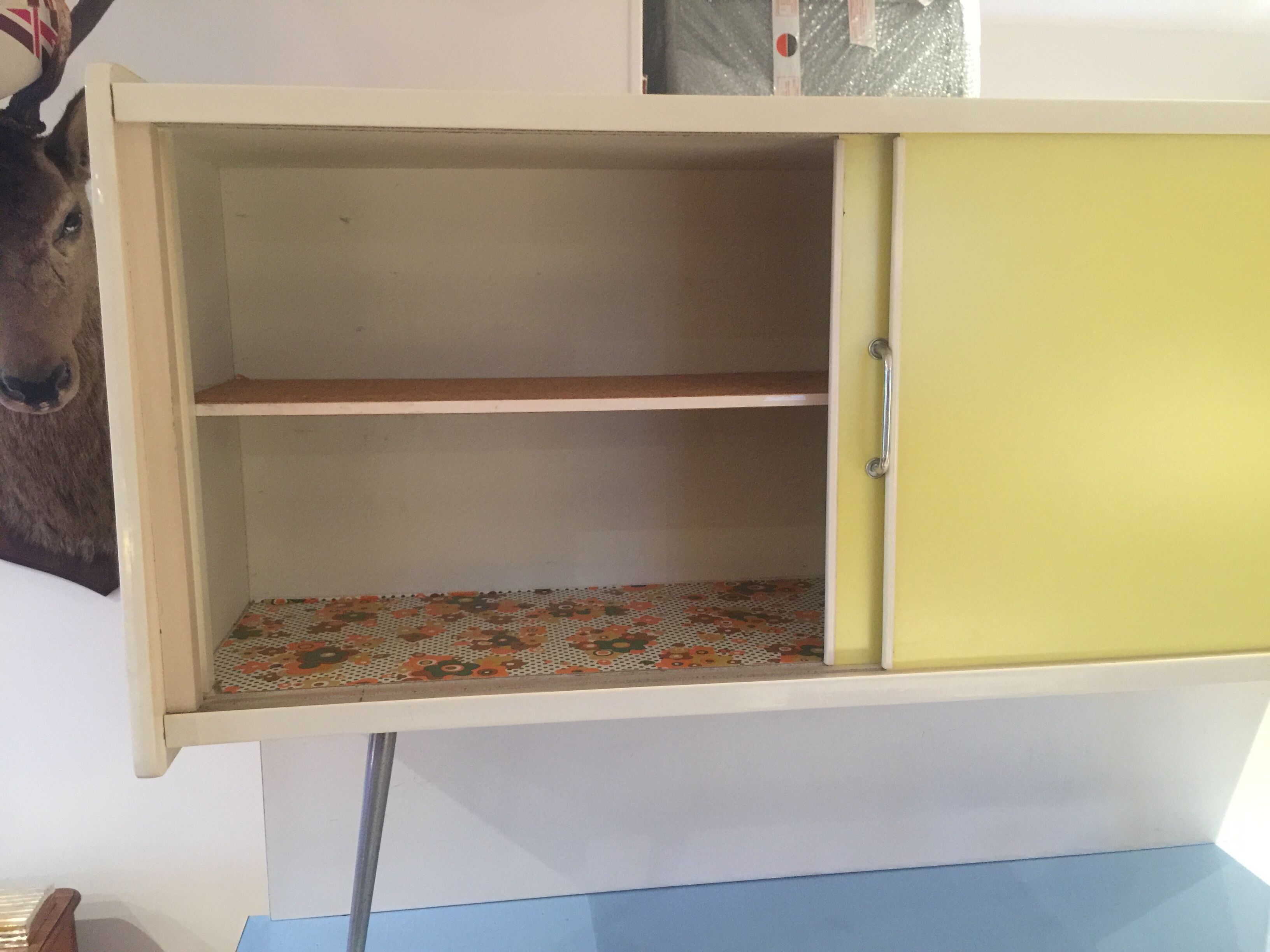Blue and yellow formica buffet