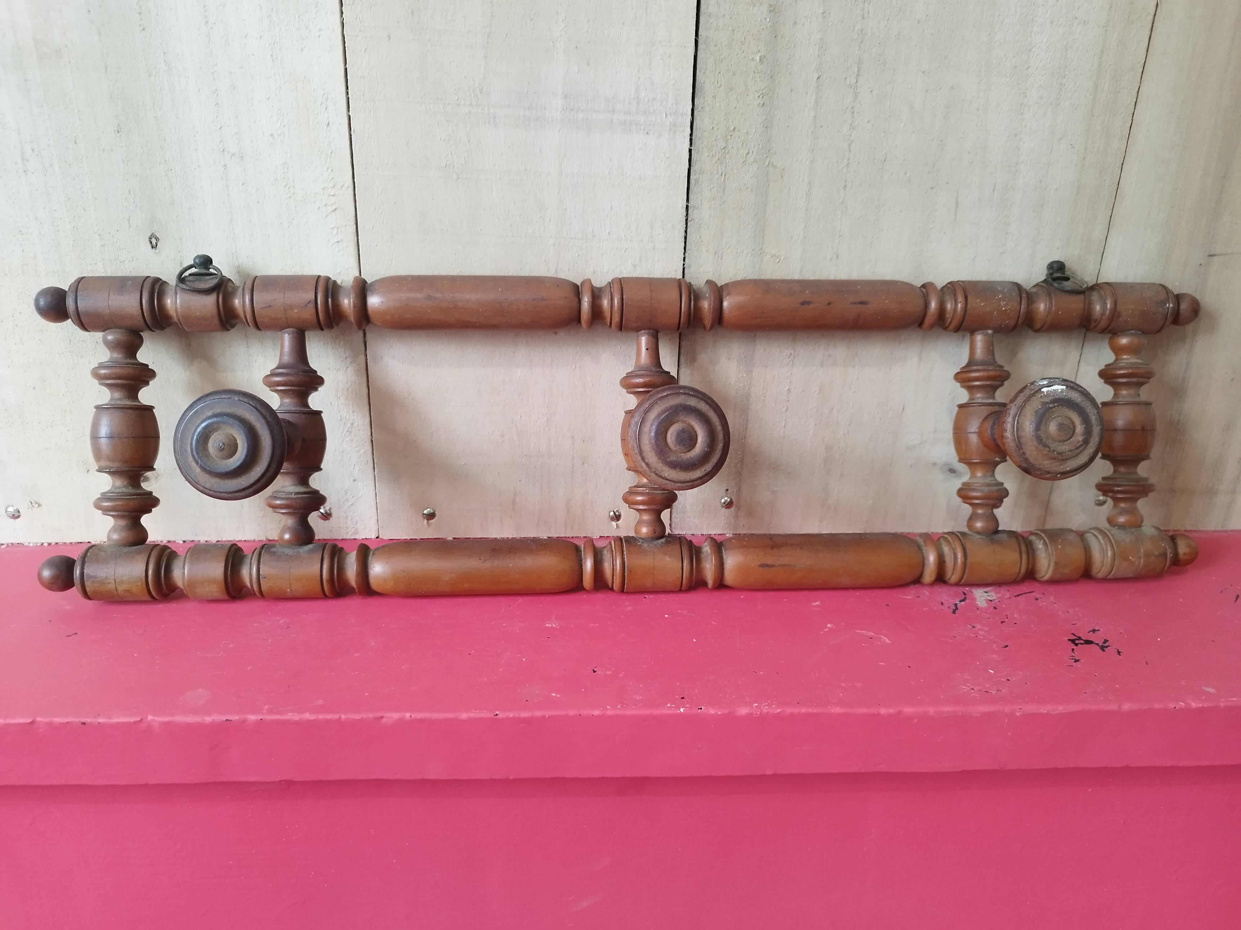 Old wooden wall coat rack