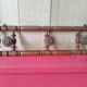 Old wooden wall coat rack