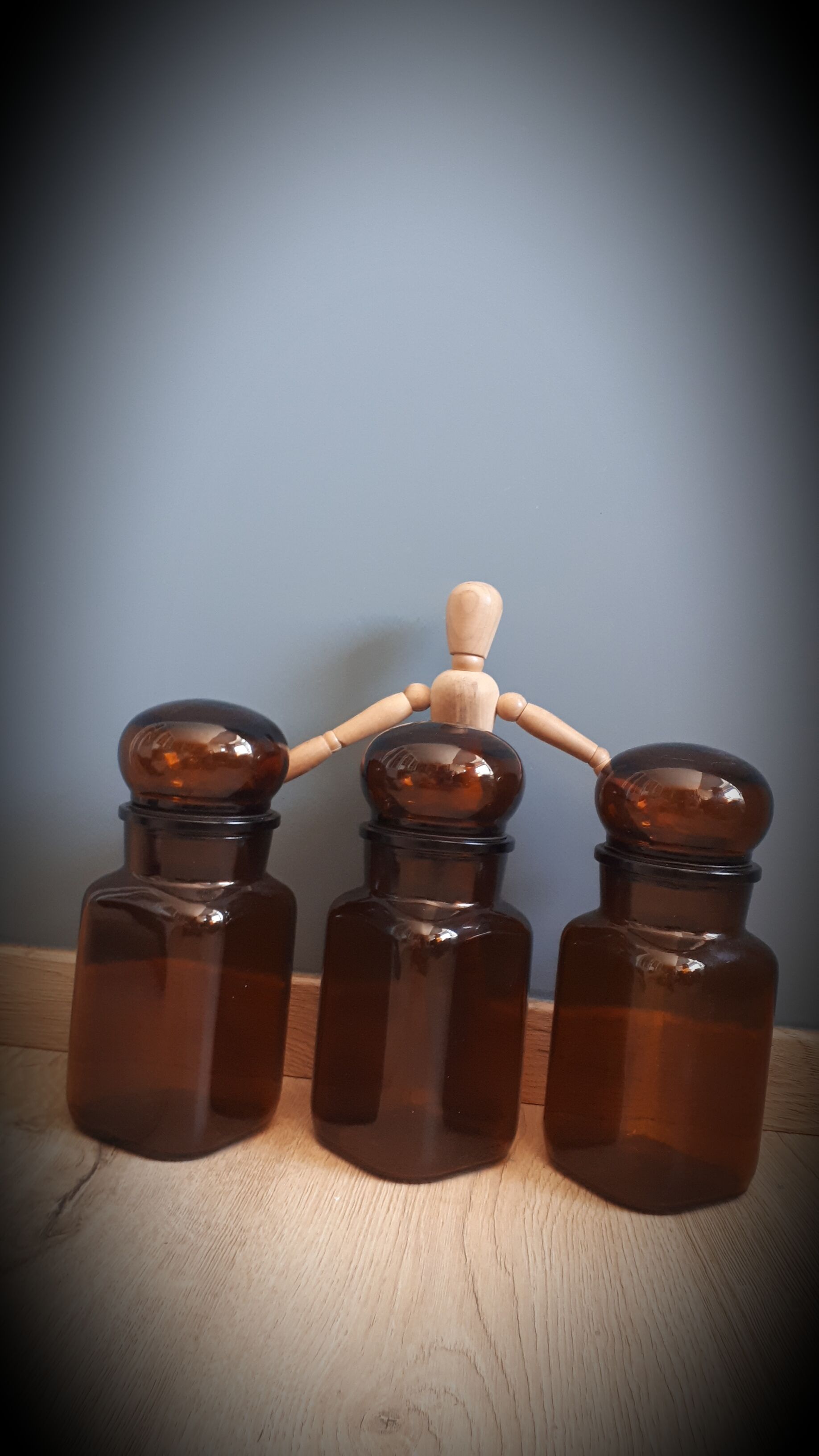 Trio round brown apothecary bottles