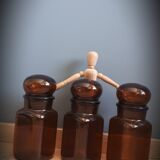 Trio round brown apothecary bottles