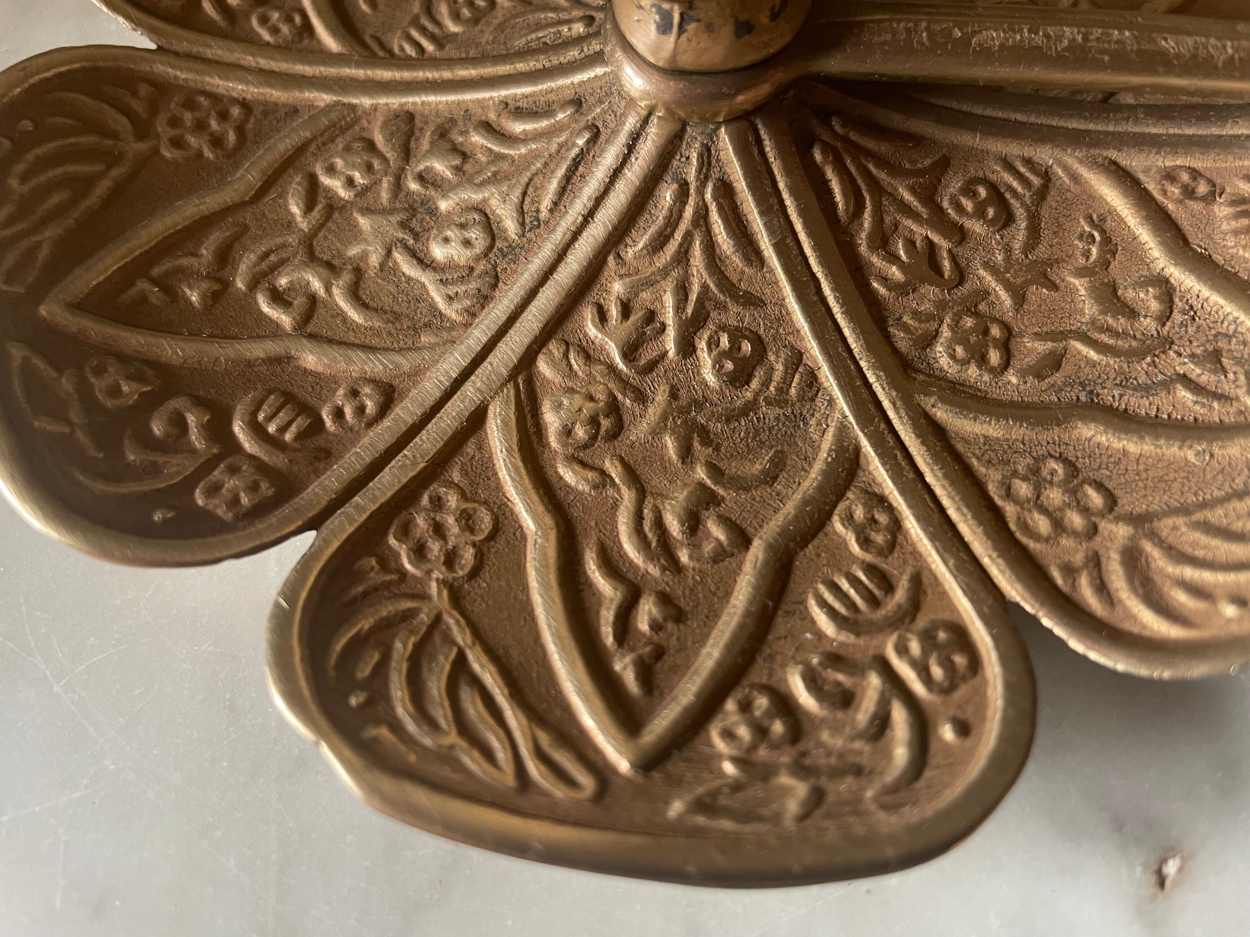 Brass flower candle holder