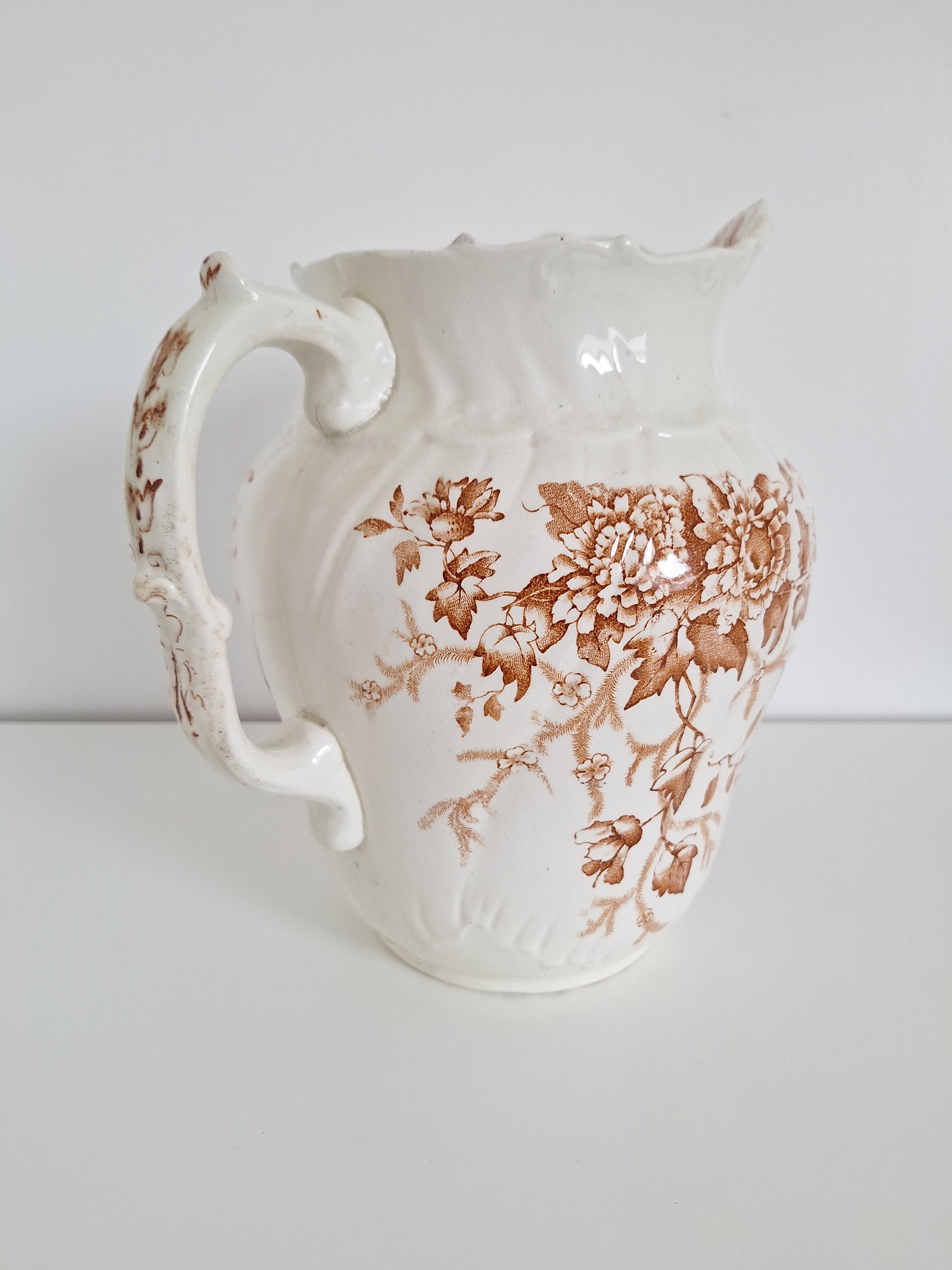 Vintage toilet pitcher