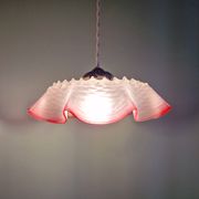 Pair of clear and pink satin glass scalloped pendant lights, 1920s-30s