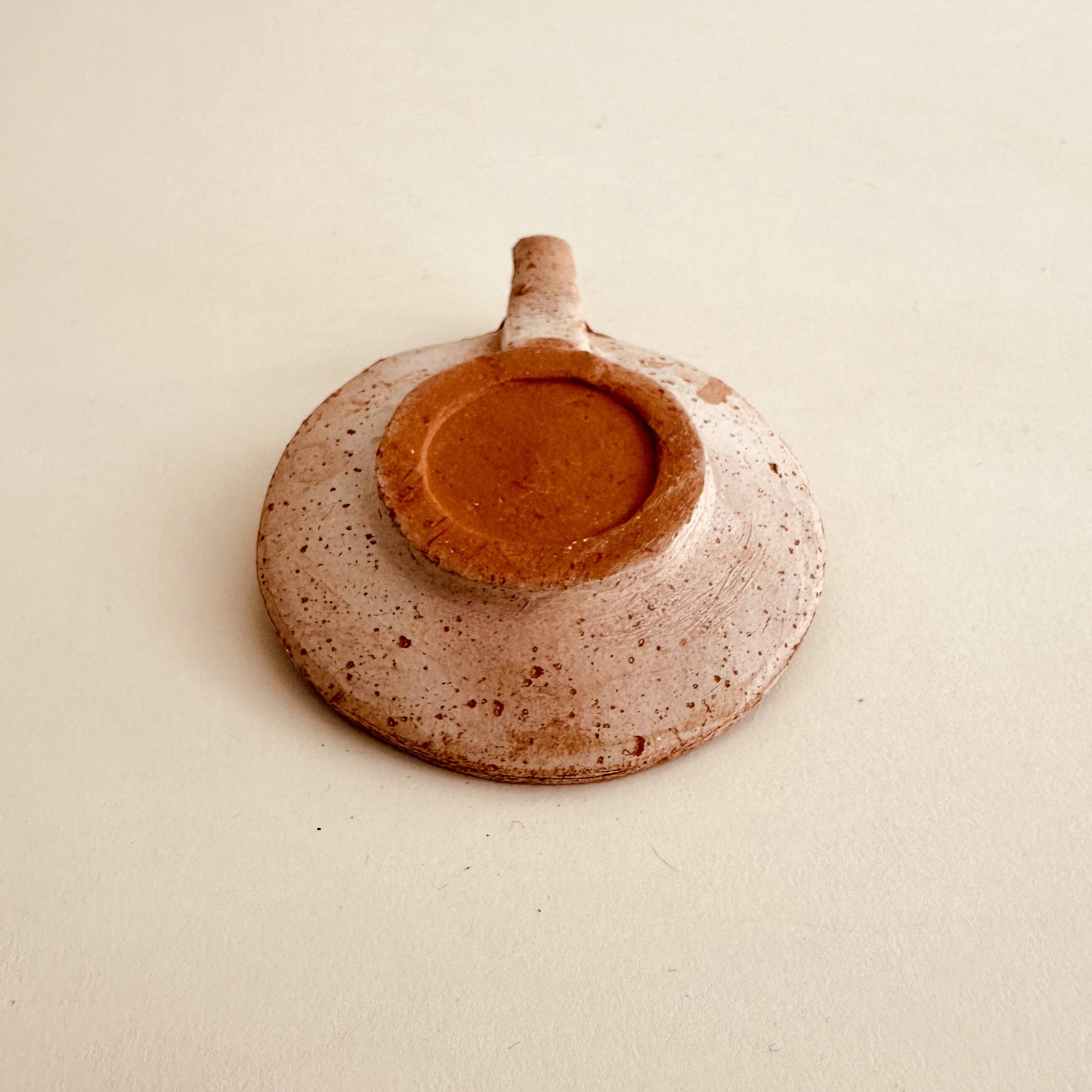 Terracotta candle holder