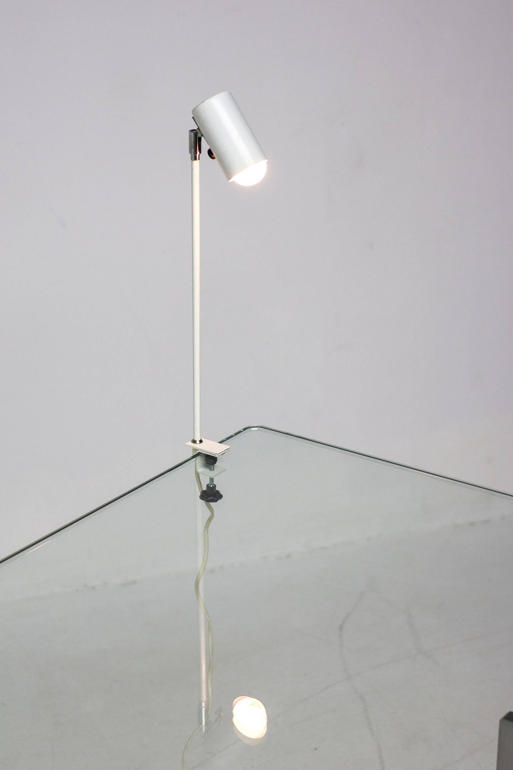 Modern Bauhaus style lamps in white, ideal for the library or study.