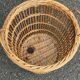 Round wicker and rattan basket with handle