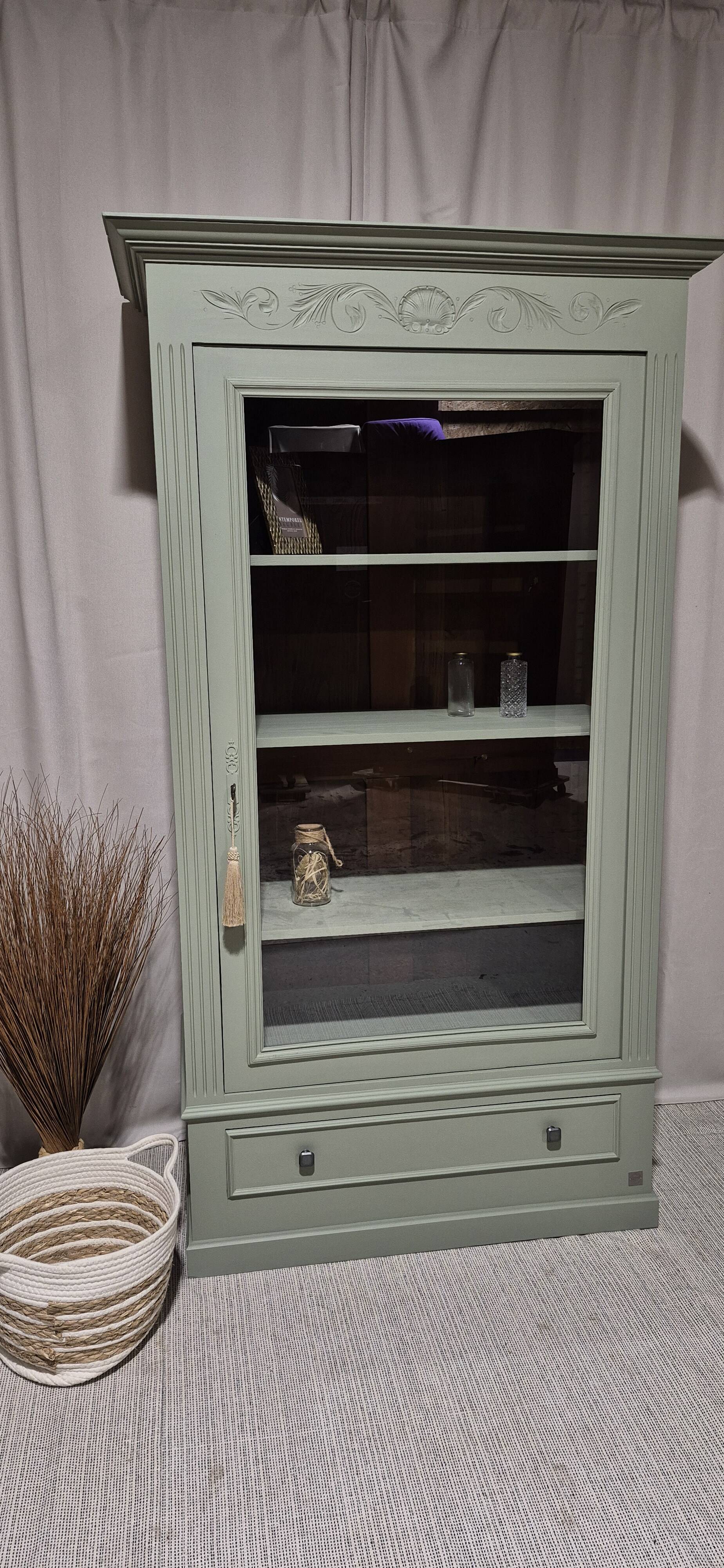 Glass display cabinet with drawer
