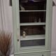 Glass display cabinet with drawer