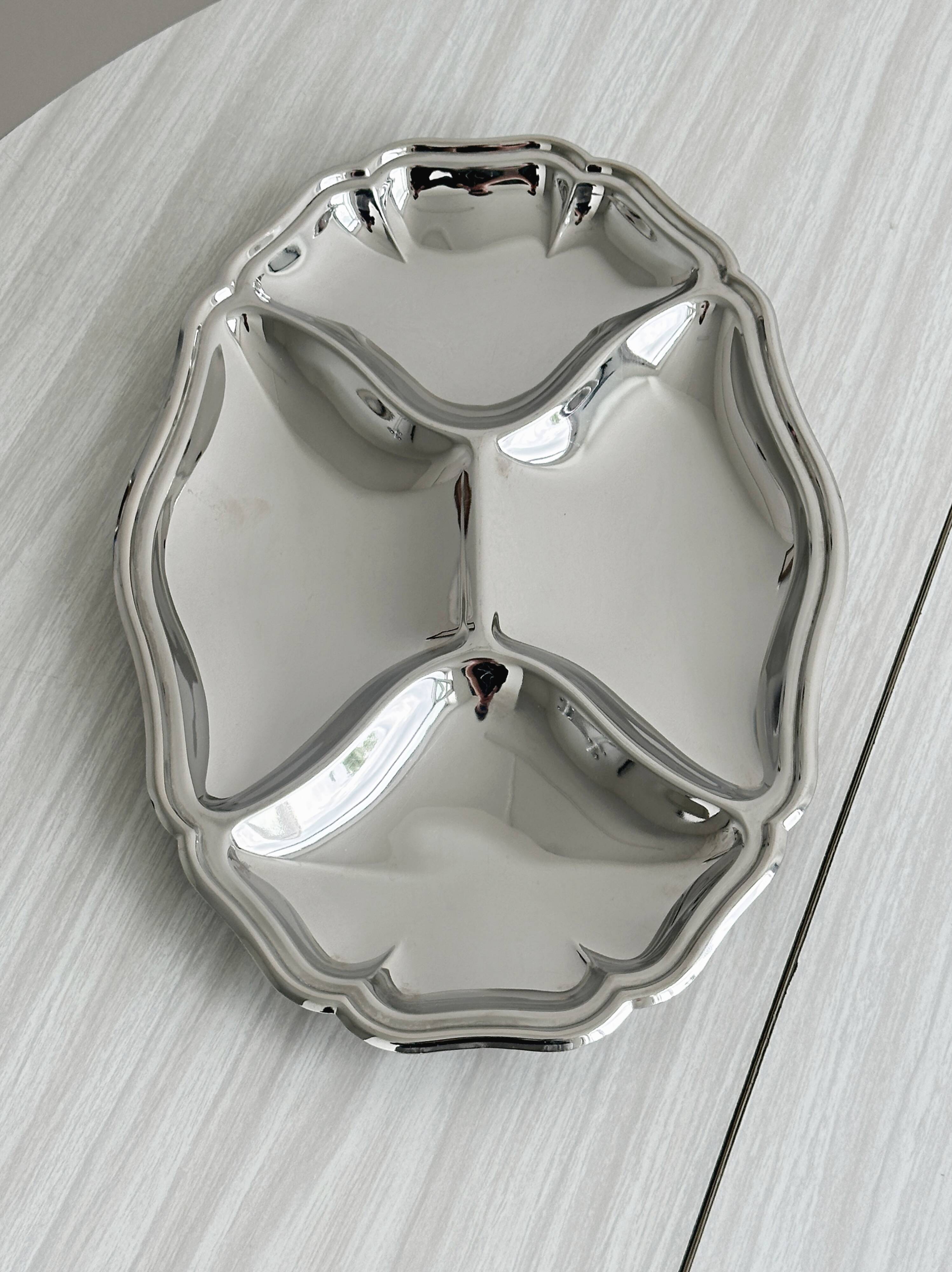 Shiny silver stainless steel compartment dish