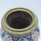 Bayeux/Imari vase mounted in porcelain with bronze frame