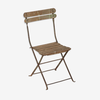 Old folding garden chair with slats