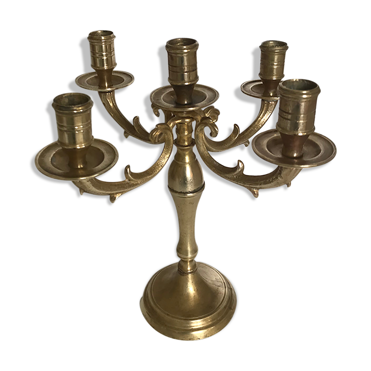 Ancient gilded bronze candlestick