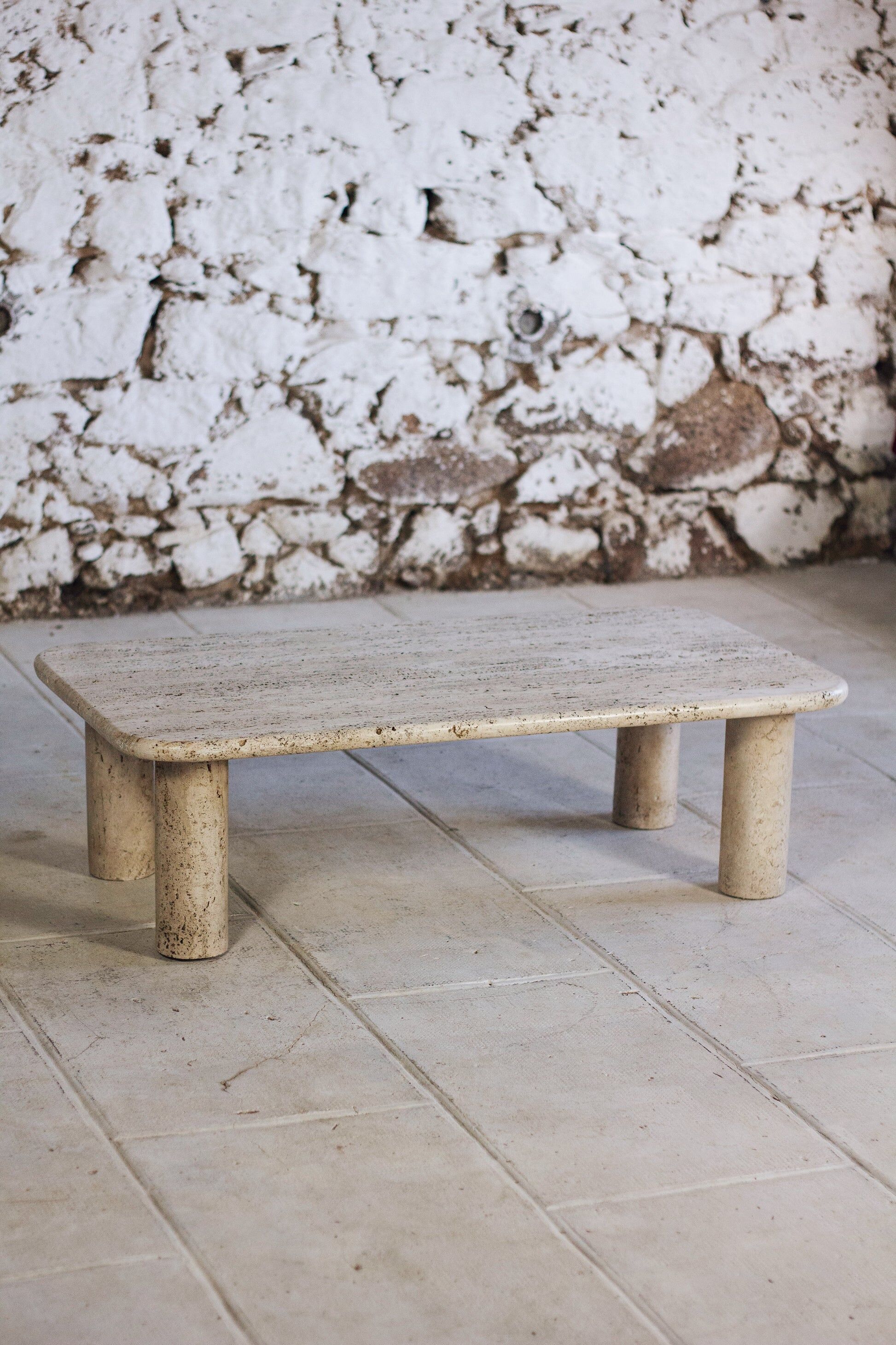 Travertine coffee table in the style of Angelo Mangiarotti, 1970.