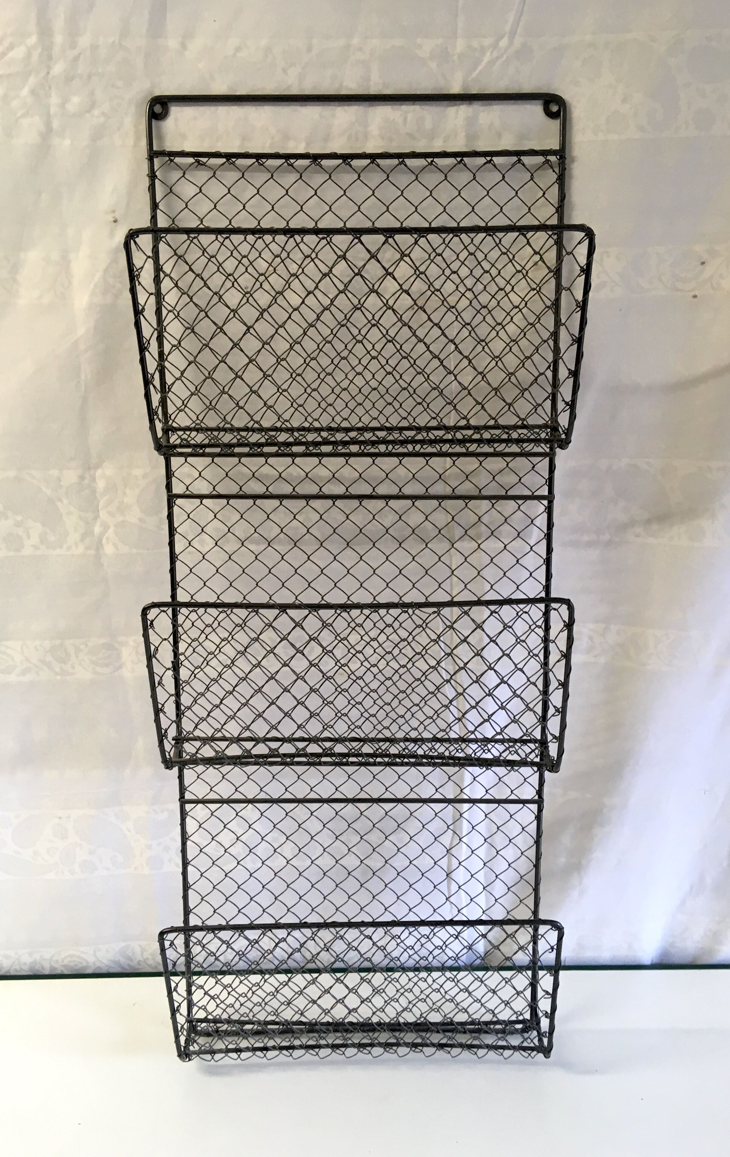 Industrial-style wall-review holders