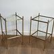 Pair of brass side tables attributed to Maison Jansen