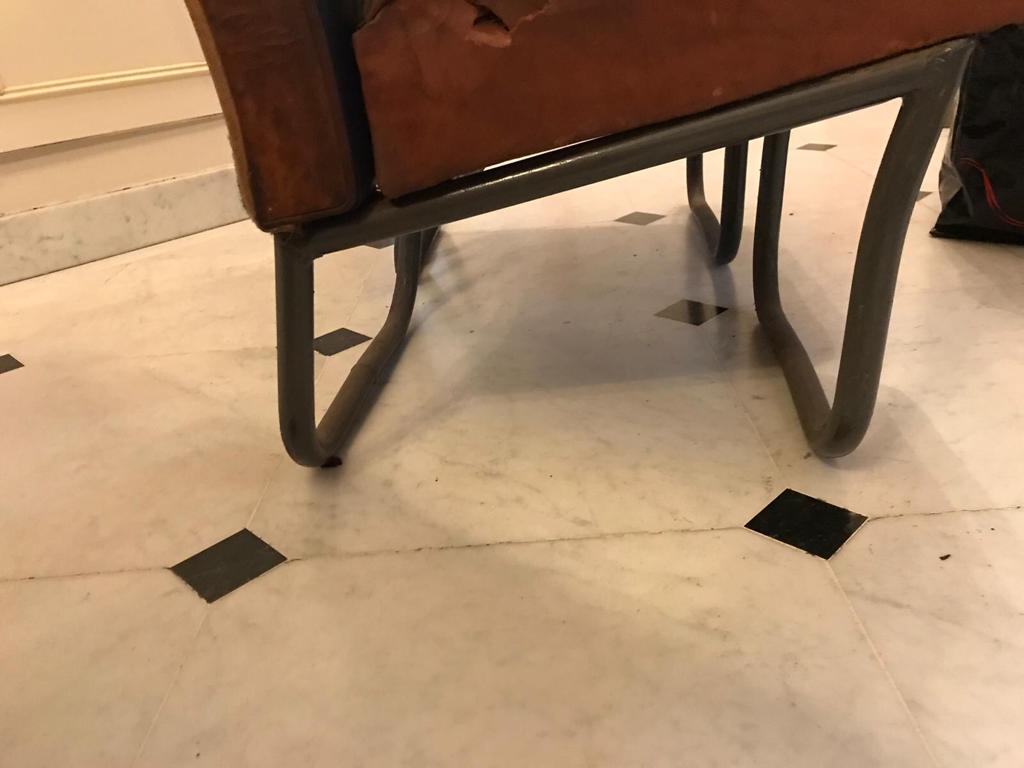 Vintage 1950s leather double-plane bus armchairs