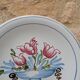 Plate with hand-painted flower bouquet on light blue background 25cm