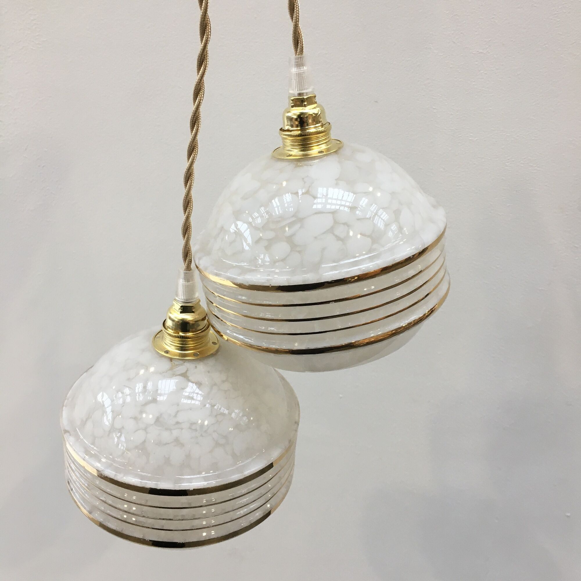 Pair of Art Deco ball suspensions in white Clichy glass