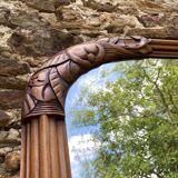 Beveled art deco mirror, carved wood