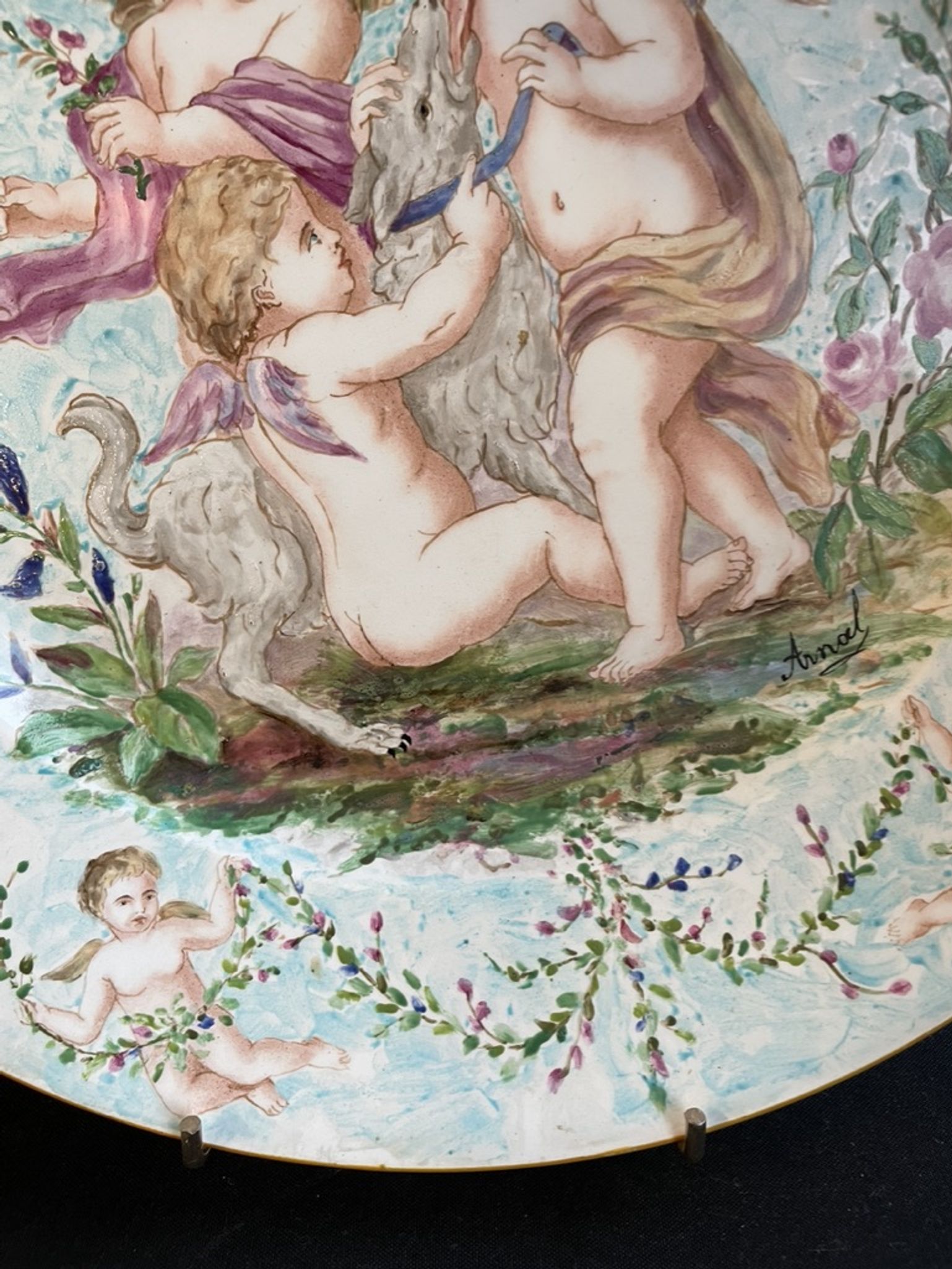 Round earthenware dish - hand decoration signed and marked