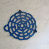 Dessous de plat en fonte