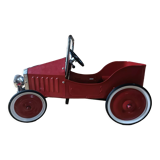 Vintage red pedal car