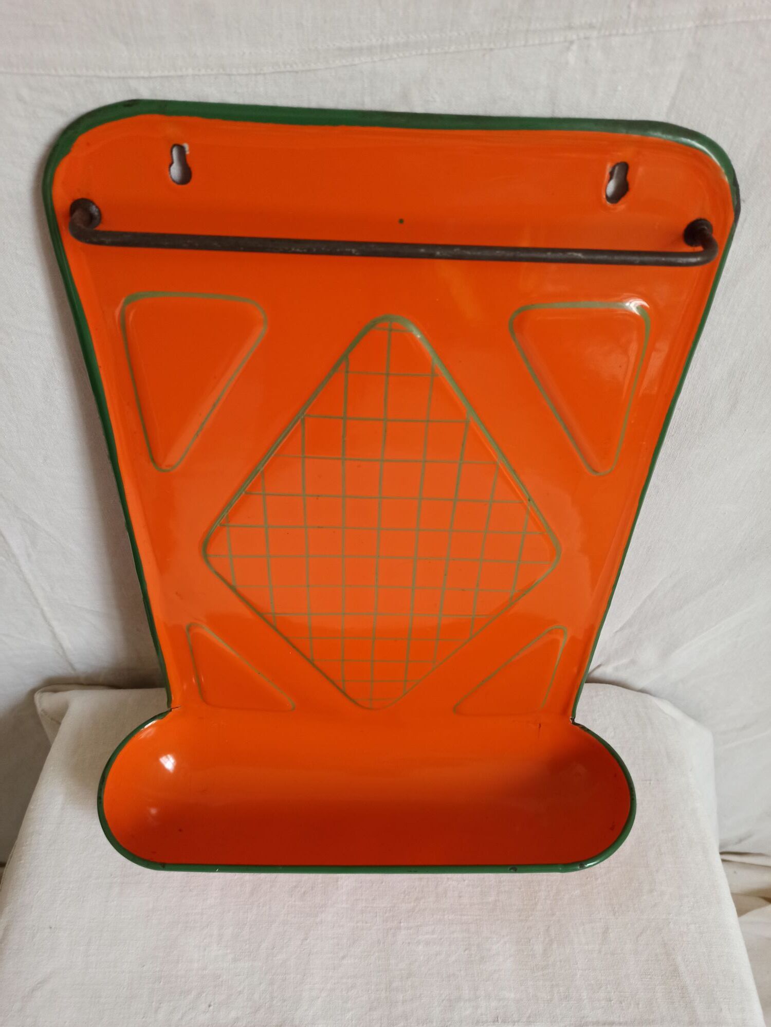 Orange enamelled kitchen utensil door