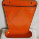 Orange enamelled kitchen utensil door