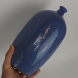 Signed enamelled terracotta bottle vase