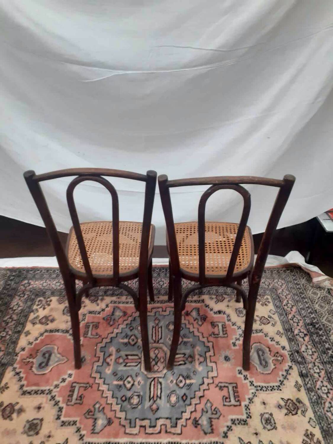 2 vintage caned bistro chairs