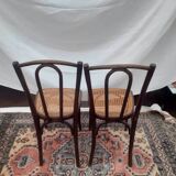 2 vintage caned bistro chairs