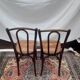 2 vintage caned bistro chairs