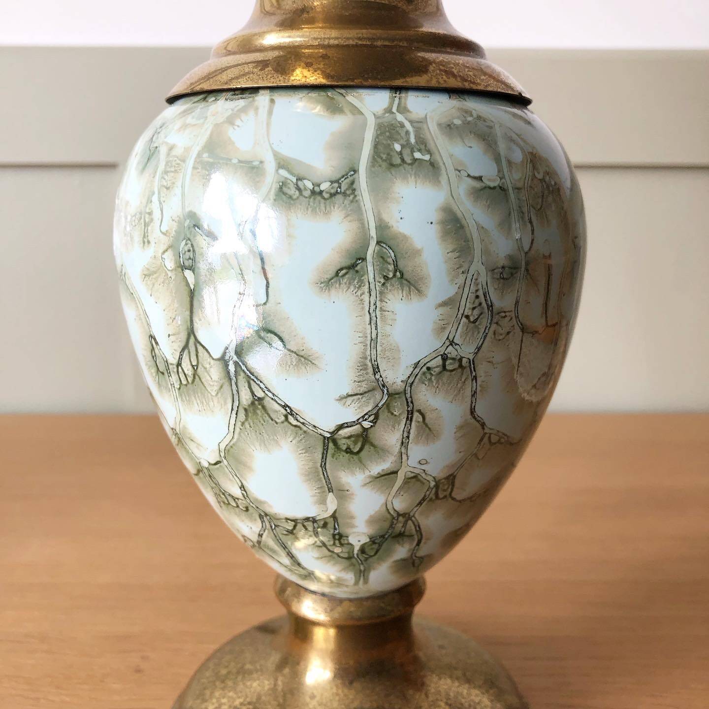 Vintage gold metal and ceramic vase
