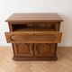 Rustic wooden TV unit with a swivel top and moulded doors.
