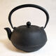 Black cast iron teapot