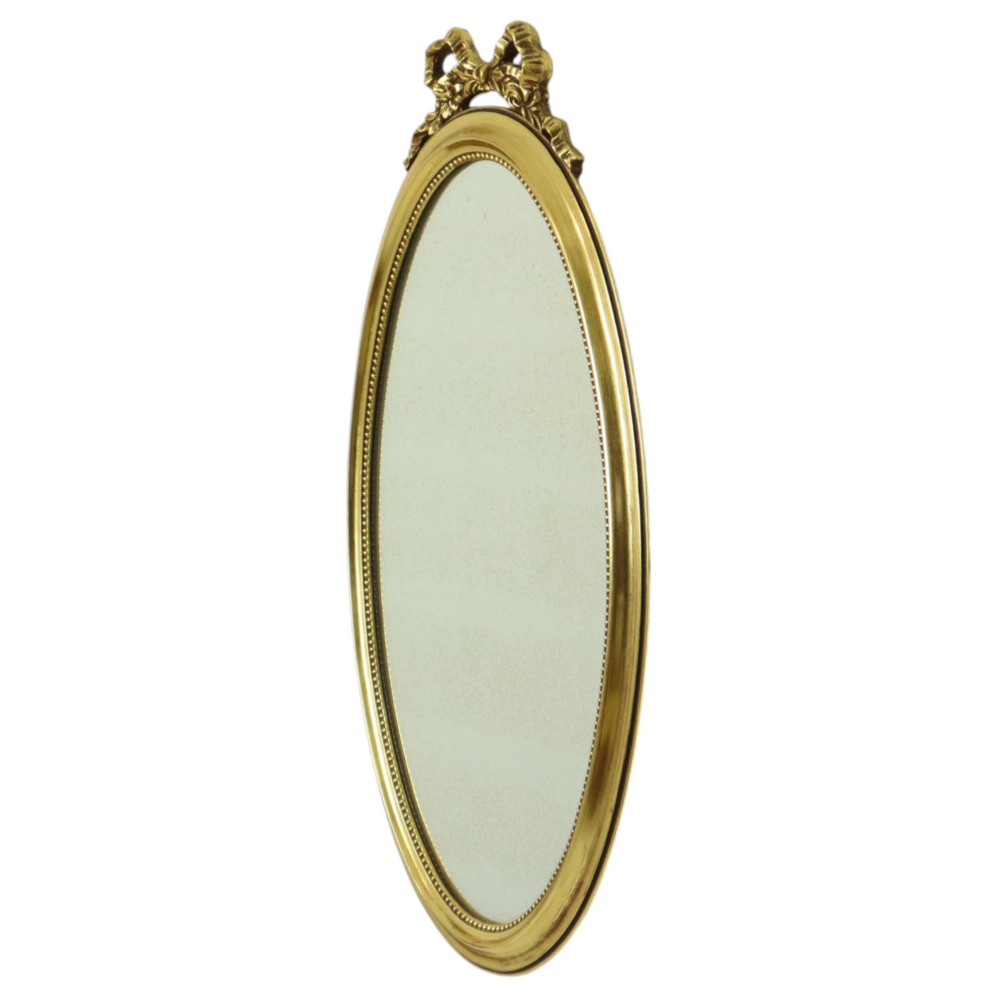 Miroir ovale classique doré à décor de ruban, France
